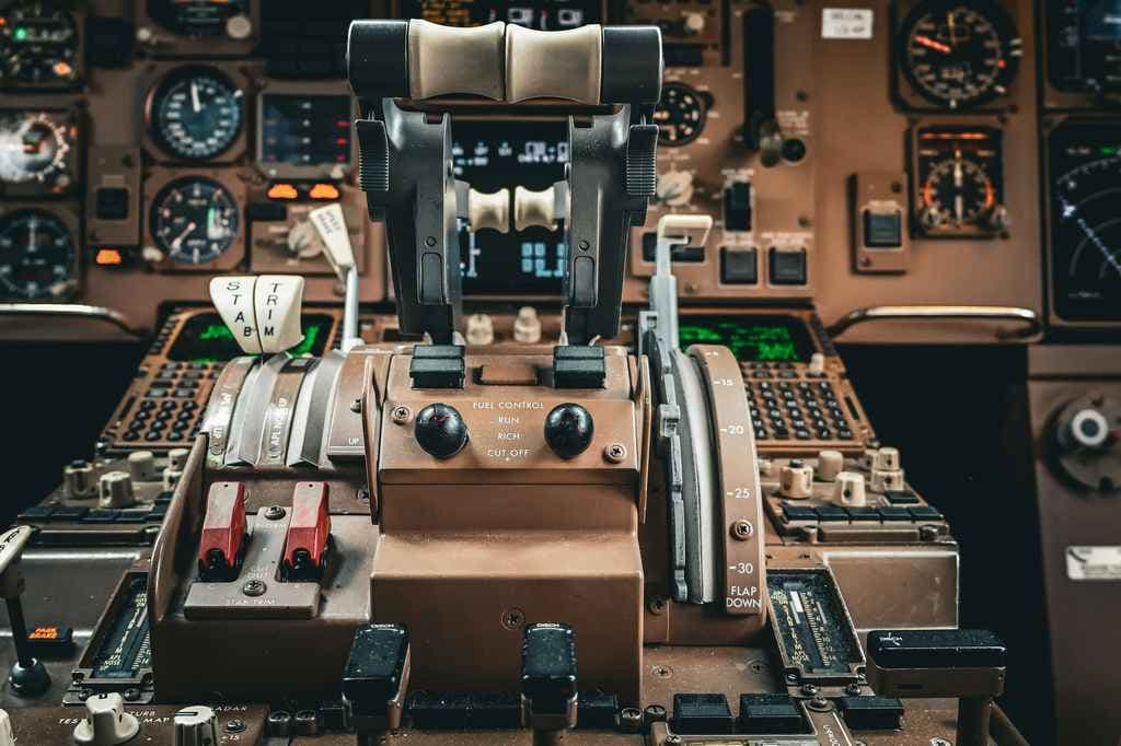 Comparison table showing aerospace functional safety standards like DO-178C and ARP4754A next to their automotive ISO 26262 equivalents for system, software, and hardware development.